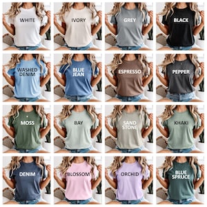 May include: A collection of short-sleeved t-shirts in various colors, each labeled with its color name in white text. Colors include white, ivory, grey, black, washed denim, blue jean, espresso, pepper, moss, bay, sand stone, khaki, denim, blossom, orchid, and blue spruce.
