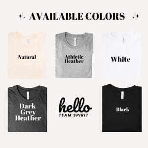Peut inclure: Image pr&eacute;sentant des t-shirts de diff&eacute;rentes couleurs : Naturel, Gris Athl&eacute;tique, Blanc, Gris Fonc&eacute; Chin&eacute; et Noir. Le texte "AVAILABLE COLORS" est en haut, avec "hello TEAM SPIRIT" en dessous. Les t-shirts sont bien pr&eacute;sent&eacute;s.