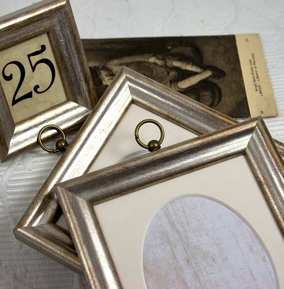 Wallet Size Ovals 3 Photos In Simple Silver Deluxe Frame Wallet Size Ovals 3 Photos In Simple Silver Deluxe Frame