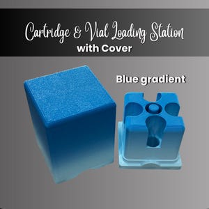 May include: A blue gradient cartridge and vial loading station with cover. The text reads Cartridge & Vial Loading Station with Cover and Blue gradient. The station features a square base with four circular cutouts and a central post.