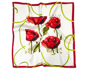 May include: Square white scarf with a red border and a design of four red roses. Green vines and leaves accent the roses. The scarf is made of a silky material.