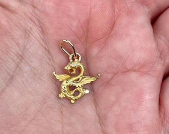 Antique 14K yellow gold dragon pendant