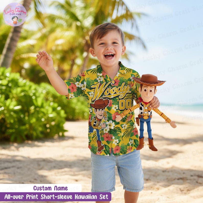 May include: A child in a yellow Hawaiian shirt with a "Woody" graphic and floral pattern, and denim shorts, holding a Woody doll. The shirt features the text "Woody 00". The scene is set on a beach with palm trees in the background.