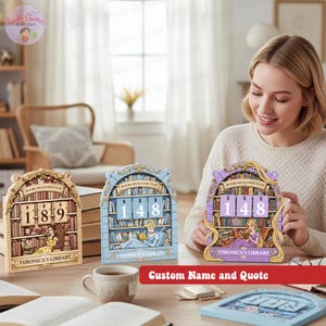 May include: Three decorative wooden book-themed calendars with the text "BOOKS READ THIS YEAR." Each calendar features a different princess illustration and the text "VERONICA'S LIBRARY." The woman is holding a purple calendar.