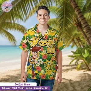May include: Yellow short-sleeve Hawaiian shirt with a floral pattern and a cartoon image of Woody. The shirt has the name "Woody" and the number "00" printed on it. The text "Custom Name" and "All-over Print Short-sleeve Hawaiian Set" are also visible.