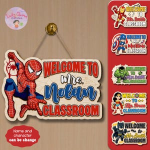 May include: Wooden classroom sign featuring Spider-Man with the text "WELCOME TO Mrs. Nolan CLASSROOM" in red and blue. Additional superhero-themed signs are displayed on the right. The sign is designed for a classroom setting.