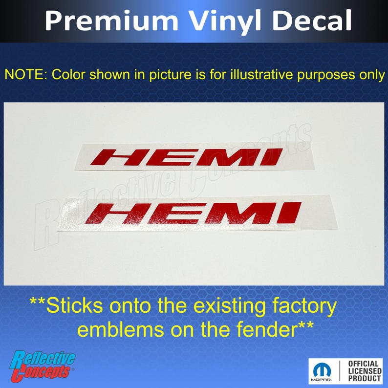 May include: Premium vinyl decal featuring two red "HEMI" emblems. The text "NOTE: Color shown in picture is for illustrative purposes only" is above the emblems. The text "**Sticks onto the existing factory emblems on the fender**" is below the emblems.