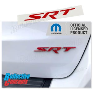 May include: Red SRT emblem with a white background. The emblem is an official licensed product from Mopar.
