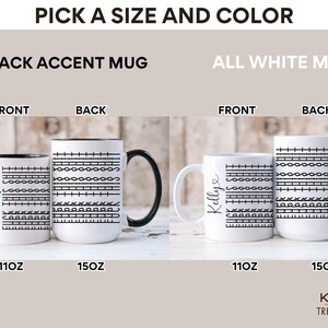 May include: Two mugs with a musical note design. The mug on the left has a black handle and rim, while the mug on the right has a white handle and rim. Both mugs are available in 11oz and 15oz sizes.