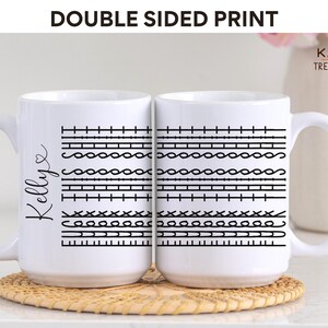 May include: White ceramic mug with a black design of various sewing stitches on one side and the name "Kelly" on the other side. The mug is a double-sided print.