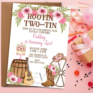 May include: A birthday invitation with a cowgirl theme, featuring the text "Rootin' Two-Tin" and "Oakley is turning Two!" The design includes a cake, guitar, cowboy boots, and a wagon wheel, decorated with pink flowers. The invitation is on a white background.