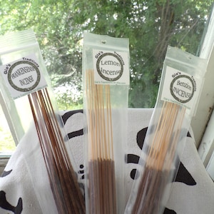 May include: Three packages of incense sticks, each with a different scent. The packages are labeled "Frankincense Incense", "Lemon Incense", and "Benzion Incense".