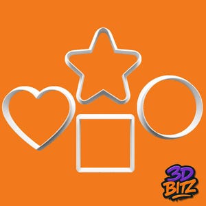 May include: Four white cookie cutters in the shapes of a heart, star, square, and circle against an orange background. The cutters are made of a light-coloured material and are arranged in a visually appealing manner. The 3D BITZ logo is in the bottom right corner.