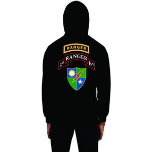 May include: Black hooded sweatshirt with a green, blue, and yellow military patch on the back. The patch has a lightning bolt, a star, and a sun. The text "RANGER" is on the patch, and the text "2D RANGER BN" is on a red banner above the patch.