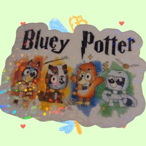May include: A holographic sticker featuring four cartoon characters in wizard attire, with the text "Bluey Potter". The characters are in shades of orange, brown, and blue, with accents of gold and white. The background is light green with decorative elements.