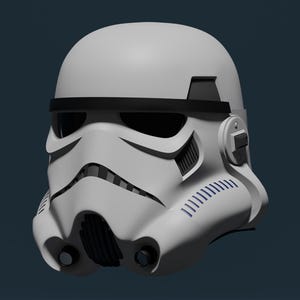 以下が含まれることがあります： 黒いアクセントが付いた白いストームトルーパーヘルメット。特徴的なフェイスマスクと換気口の詳細が特徴です。ヘルメットは滑らかで丸みを帯びたデザインで、濃い青色の背景に配置されています。