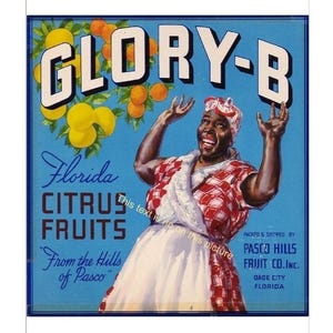 May include: Vintage citrus fruit crate label featuring the text "GLORY-B" and "Florida Citrus Fruits." The label depicts a smiling woman with her arms raised, surrounded by oranges and lemons. The label also includes the text "From the Hills of Pasco."