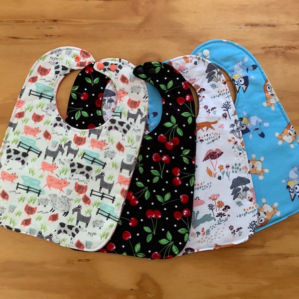 Big Kid  Moisture Proof Bibs, Choose Your Favorite  Print, Double Snap, 9 1/2 x 13 inches