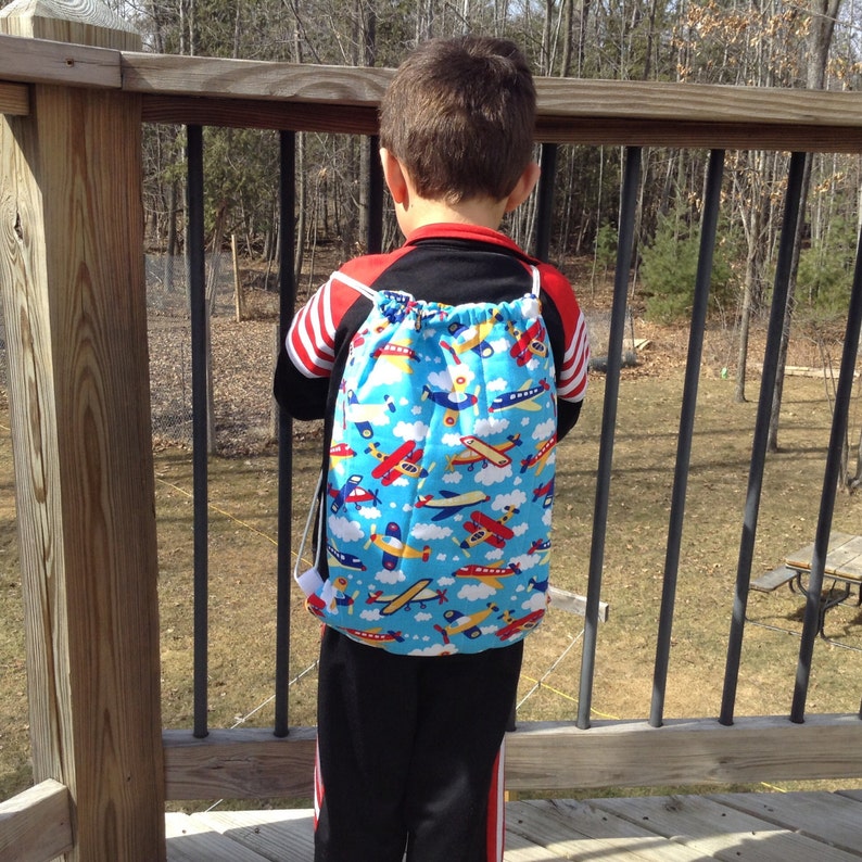 ready to ship Quilted Backpack for Toddler Drawstring Closure Bright Airplanes