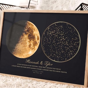 May include: A rectangular framed print with a black background featuring a golden moon phase on the left and a golden star map on the right. The text reads: Hannah & Tyler, In the vastness of the universe, there was a moment just for us, A night when the stars above aligned to mark a memory that will shine forever, October 14, 2023, New York, USA.