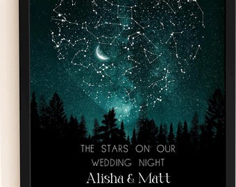 May include: A framed wall art print featuring a dark teal night sky with a heart-shaped constellation pattern above a black forest silhouette. The text reads: THE STARS ON OUR WEDDING NIGHT, Alisha & Matt, OCTOBER 7, 2023, YORKVILLE, ILLINOIS.