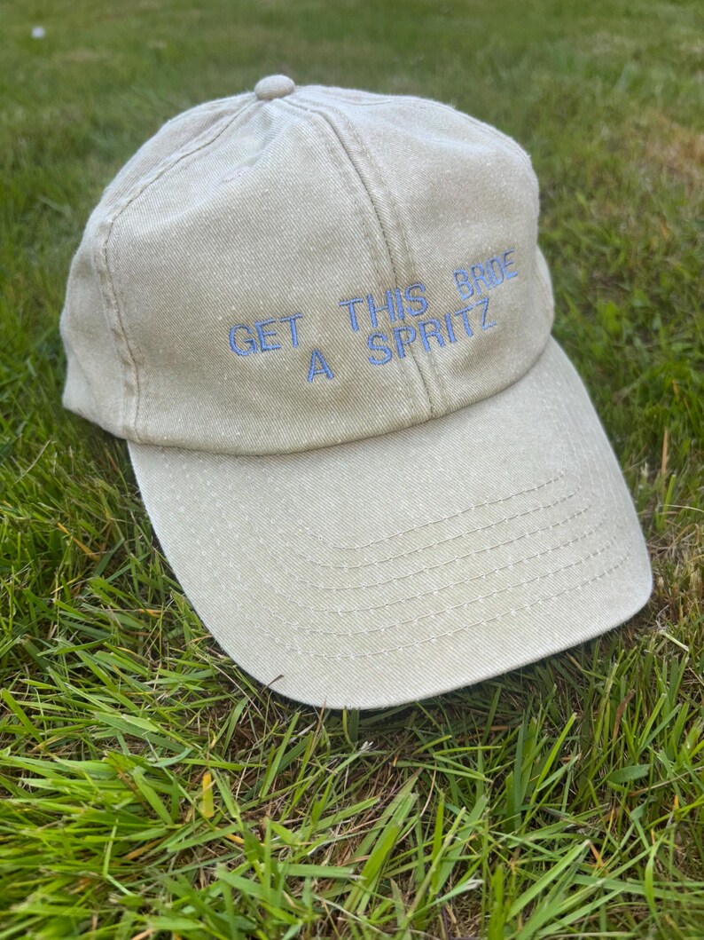 White custom embroidered baseball cap for bride, bachelorette party hat with personalised drink slogan