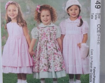 Girl's Dress and Pinafore Sewing Pattern McCall's 3949 Flared Ruffle Hem Dress w/Petticoat Party or Special Occasion Dress UNCUT Size 3 - 6