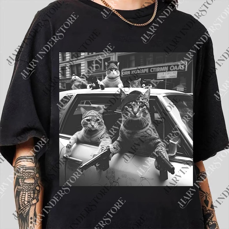 A black and white image of three cats sitting in the front seat of a car, with one of them holding a gun.