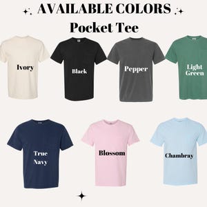 May include: A display of pocket tees in various colors, including ivory, black, pepper, light green, true navy, blossom, and chambray. The text "AVAILABLE COLORS" and "Pocket Tee" are at the top.