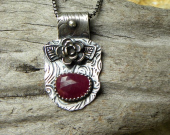 A ruby red, necklace, pendant, succulent, leaves, sterling silver