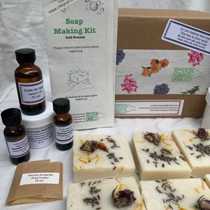May include: A soap making kit with a variety of ingredients, including shea butter, castor oil, and lavender essential oil. The kit also includes a wooden box for molding the soap.