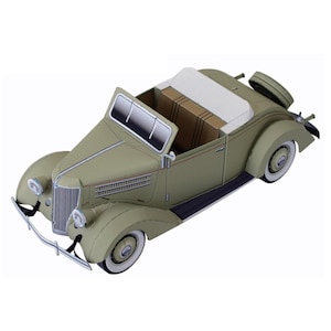 May include: A light green vintage convertible car model with white-walled tires. The model features a detailed interior with tan seats and a white convertible top. The car has chrome accents and a spare tire mounted on the back.