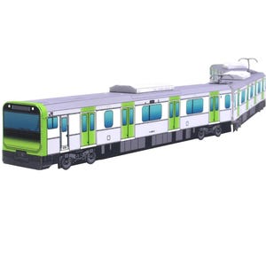 Könnte beinhalten: Ein Modellzug in Grün und Weiß. Das Dach ist grau und die Fenster blau. Die Türen sind grün und der Zug trägt das JR-Logo. Detailliertes Modell.