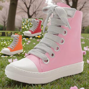 May include: Pink high-top sneakers with gray laces and a white toe cap. The sneakers have a thick white sole and metal eyelets. Additional images show similar sneakers in red and orange.