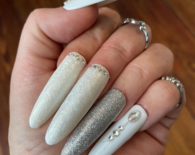 White, pearl, silver and rhinestone, very long, reusable, Press-on nails, false nails. Glossy finish.