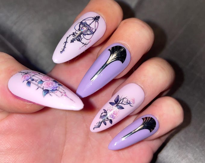 30-piece kit. Pink and purple with birdcages and roses. Sizes 0 to 11. Reusable, press-on nails, false nails. Glossy finish