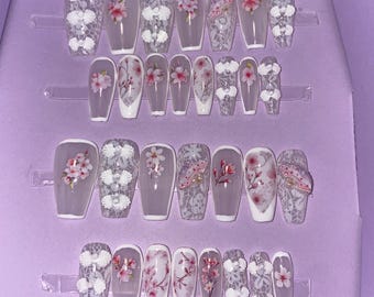 30-piece kit. White, milky, with fans, cherry blossoms. Sizes 0 to 11. Reusable, press-on nails, false nails. Glossy finish