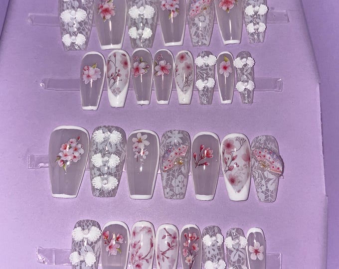 30-piece kit. White, milky, with fans, cherry blossoms. Sizes 0 to 11. Reusable, press-on nails, false nails. Glossy finish