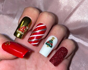 Red, gold Christmas. Cross, hat and Christmas tree. Reusable, Press-on nails, false nails. Glossy finish