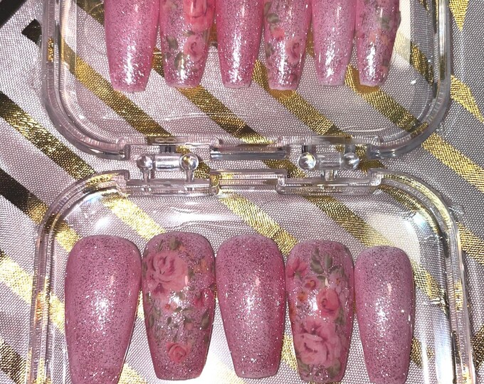 22-piece kit. Glittery pink with rose patterns. Sizes 0 to 10. Reusable, press-on nails, false nails. Glossy finish