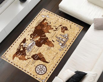May include: A vintage-style world map rug with a compass design in the center. The rug is beige with brown lines and text, and features a ship sailing on the ocean.