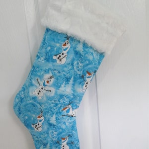 Snowman character from movie blue  Christmas stocking lined and quilted white faux rabbit fur top