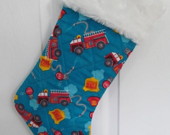 Fire engines hoses fireman Christmas stocking lined and quilted white fur  top