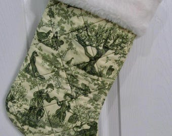 Green toile traditional Christmas stocking lined and quilted white fur top