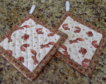 Squirrels  handcrafted quilted potholders