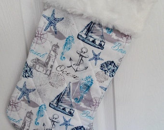 Coastal  Christmas stocking lined and quilted white faux rabbit fur  top