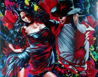 May include: A painting of a couple dancing. The woman is wearing a red dress and the man is wearing a white shirt and a black hat. The background is a colorful abstract design.
