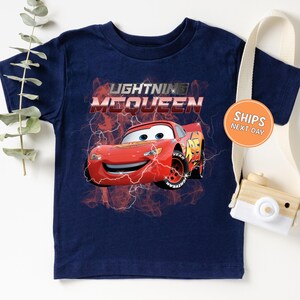 a t - shirt with a picture of a car on it