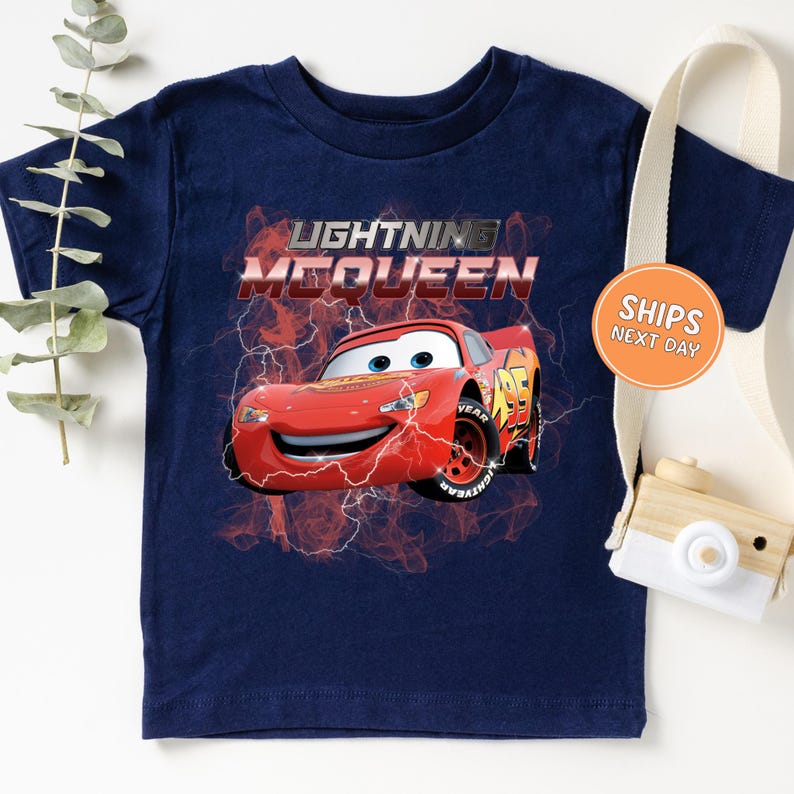 a t - shirt with a picture of a car on it