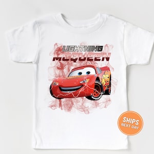 a white t - shirt with a cartoon character on it